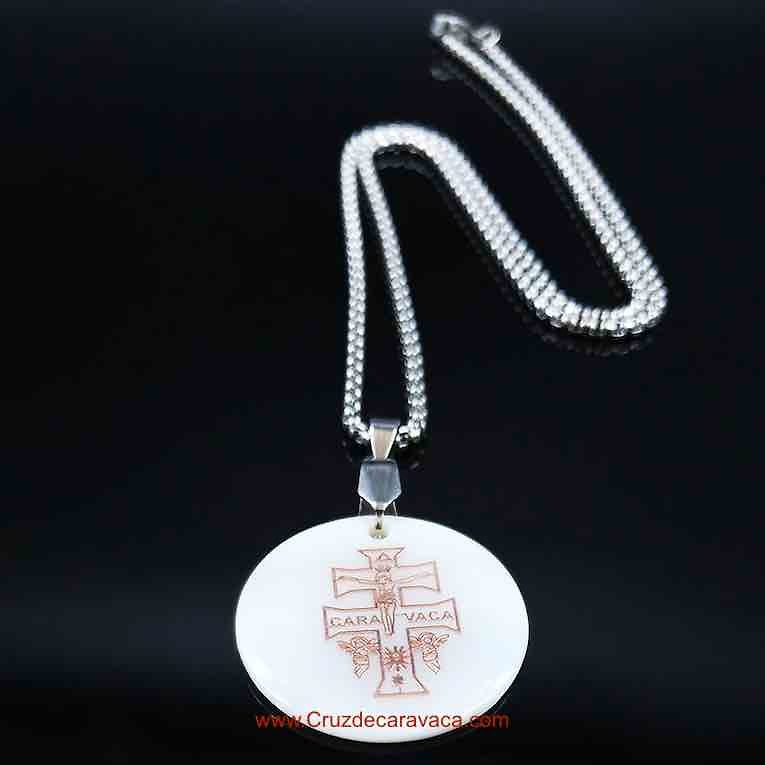 MOTHER-OF-PEARL AND COPPER CROSS MEDAL SET WITH 50 CMS CHAIN. 