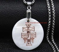 MOTHER-OF-PEARL AND COPPER CROSS MEDAL SET WITH 50 CMS CHAIN.